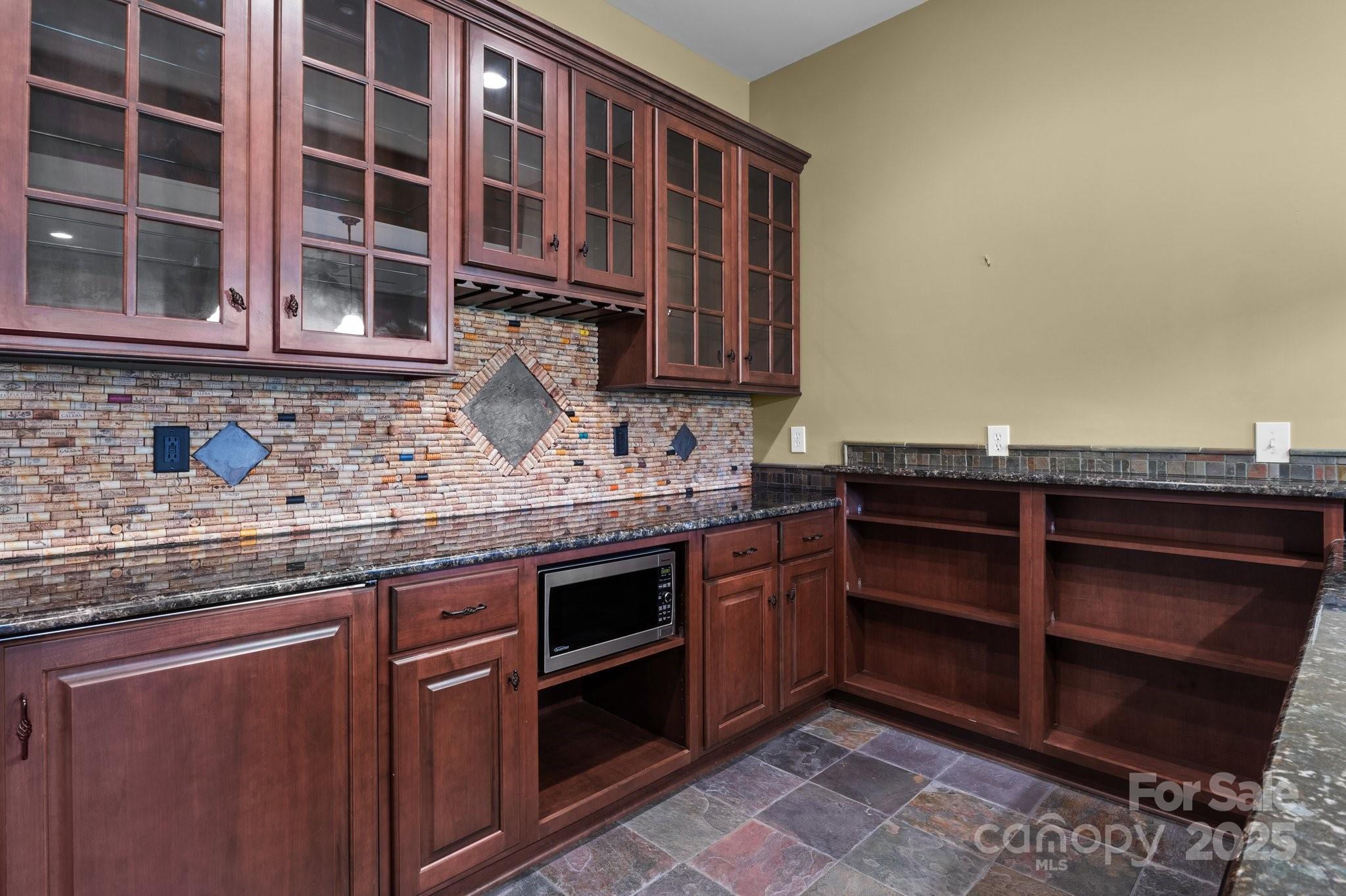 8034 Bay Pointe Drive Denver, NC 28037 - Photo 20 of 45 a kitchen with stainless steel appliances granite countertop a stove and cabinets