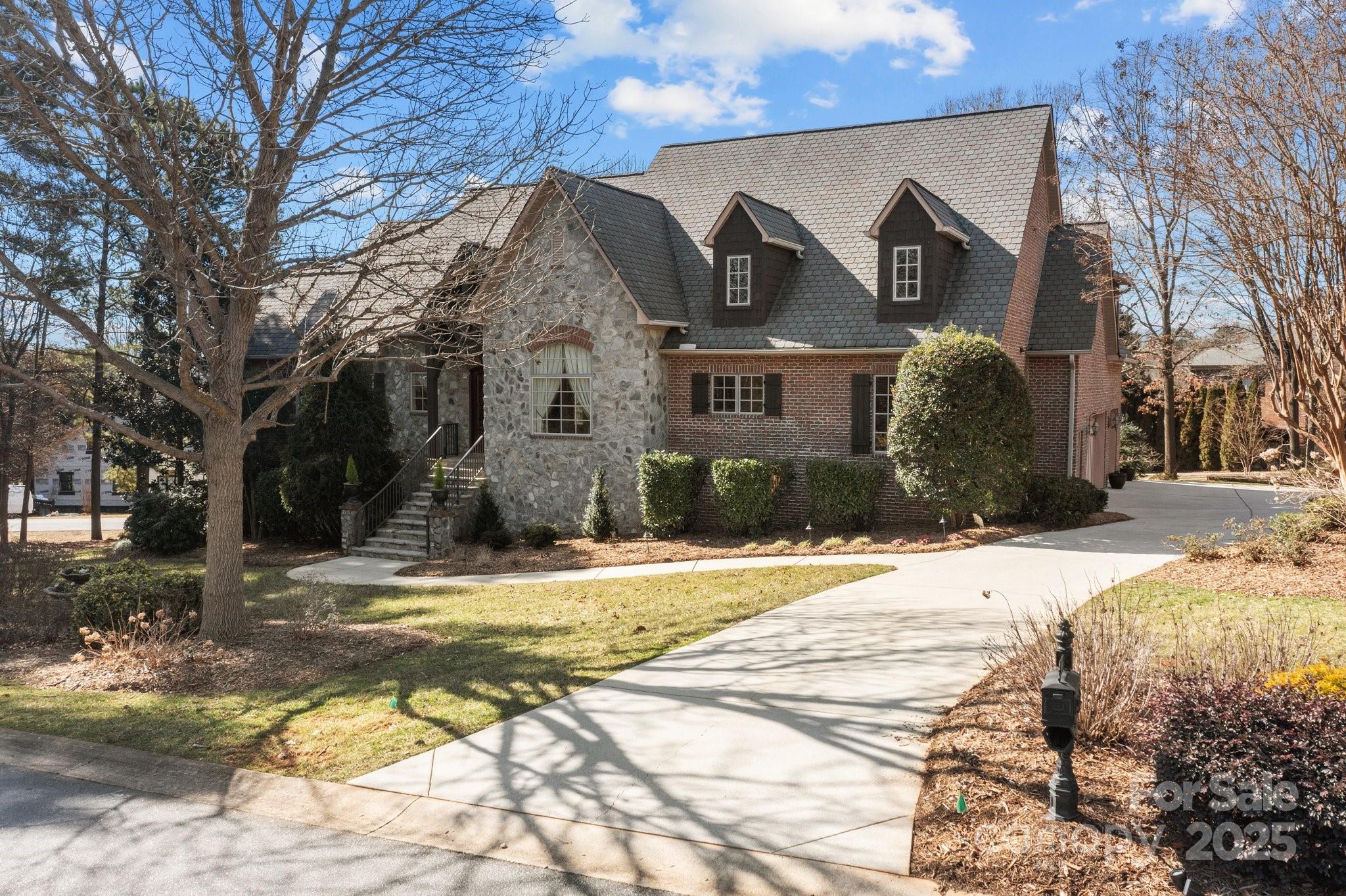 8034 Bay Pointe Drive Denver, NC 28037 - Photo 24 of 45 a front view of a house with a yard