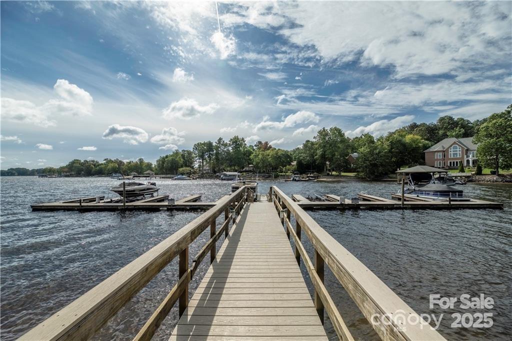 8034 Bay Pointe Drive Denver, NC 28037 - Photo 35 of 45 a view of swimming pool with a deck