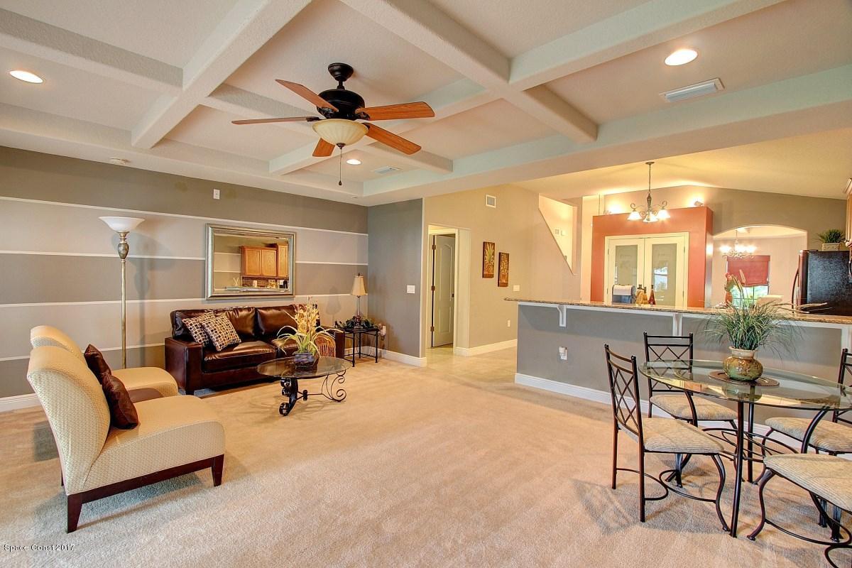 1202 Becket Place Melbourne, FL 32940 - Photo 13 of 38 a living room with furniture