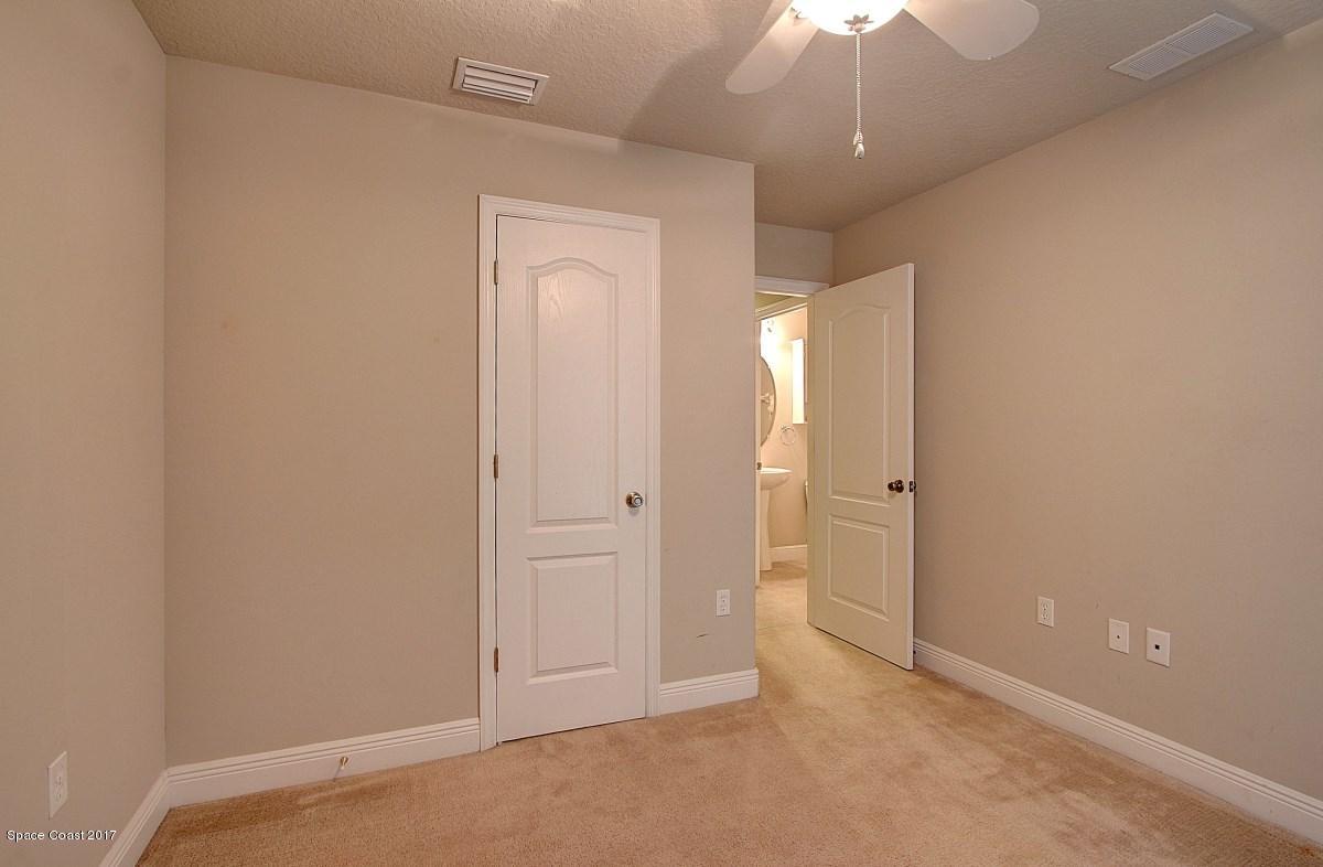 1202 Becket Place Melbourne, FL 32940 - Photo 20 of 38 an empty room with a bathroom