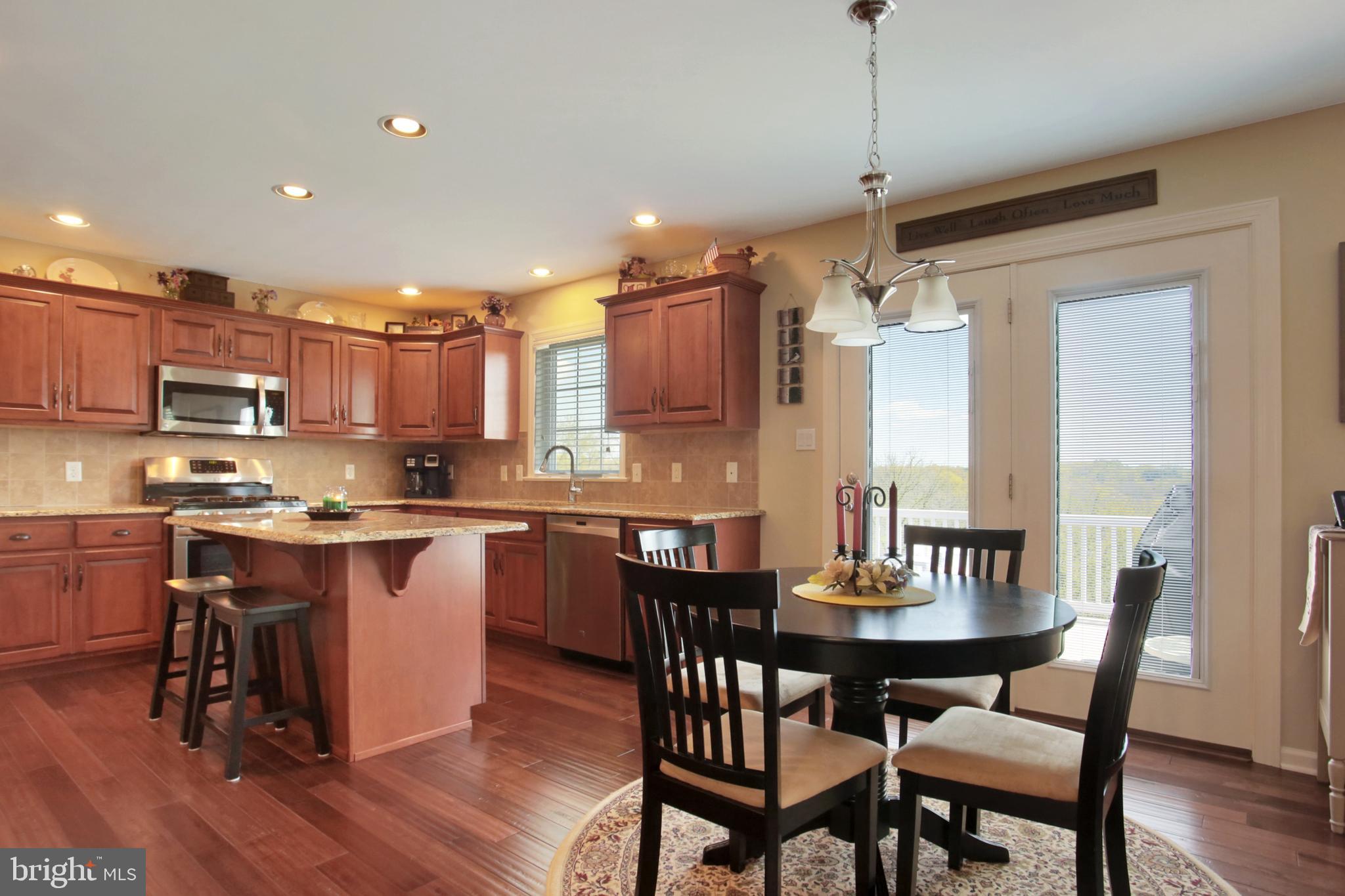 7046 Beaver Spring Road Harrisburg, PA 17111 - Photo 17 of 52 Spacious kitchen , patio doors open to deck