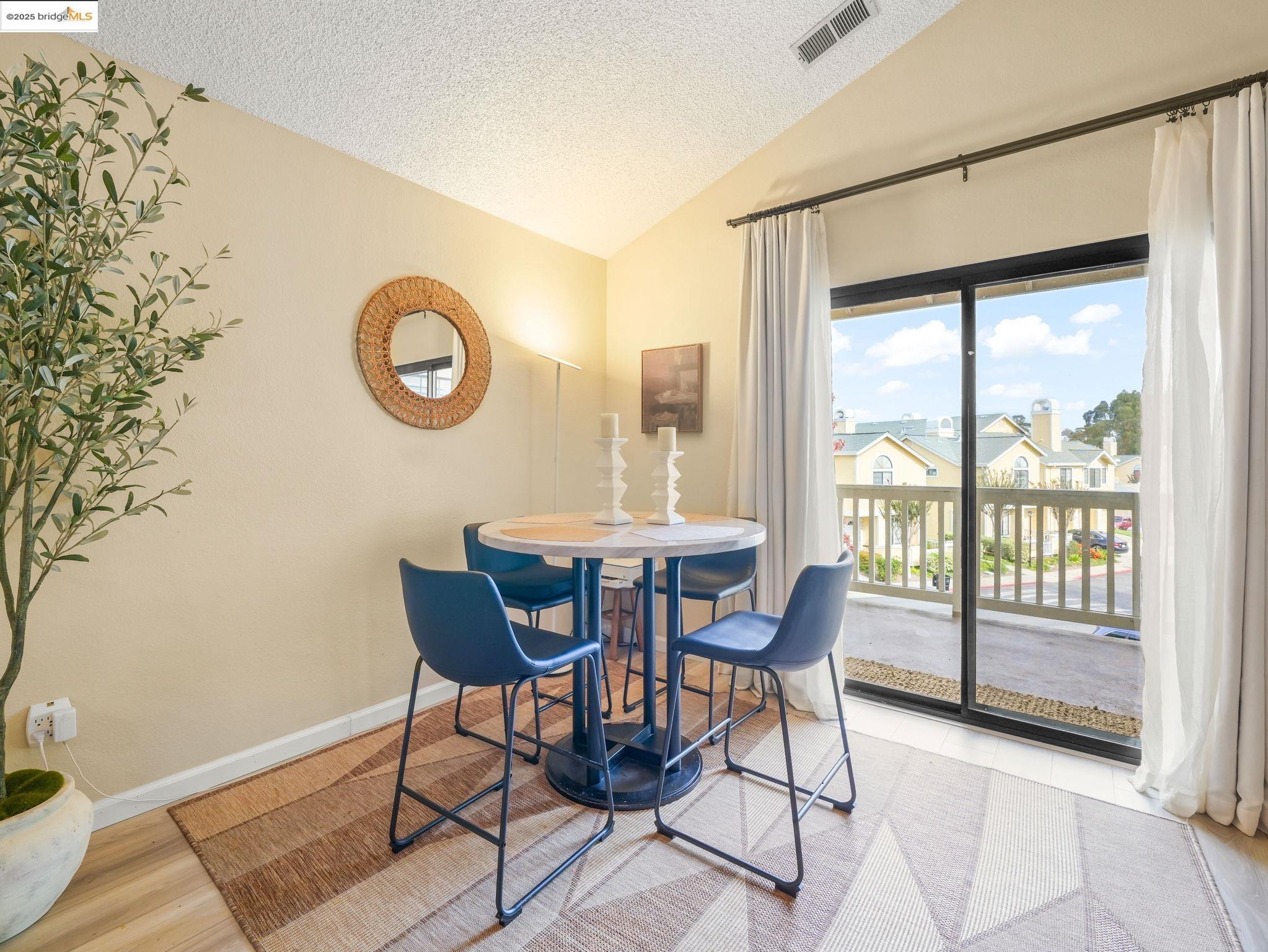 806 Devonwood Hercules, CA 94547 - Photo 12 of 24 a dining room with furniture and a window