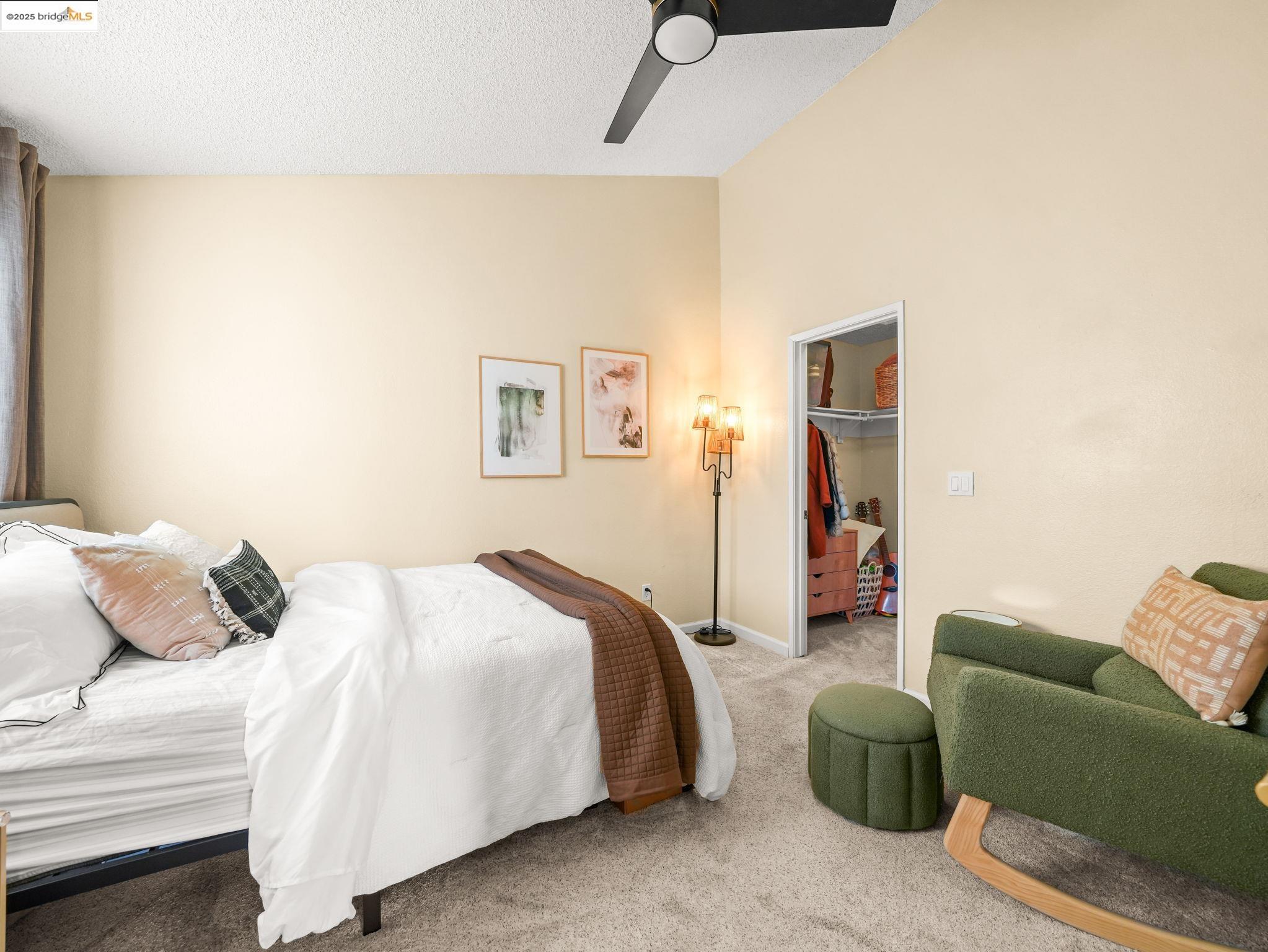 806 Devonwood Hercules, CA 94547 - Photo 18 of 24 a bedroom with a bed couch and a window