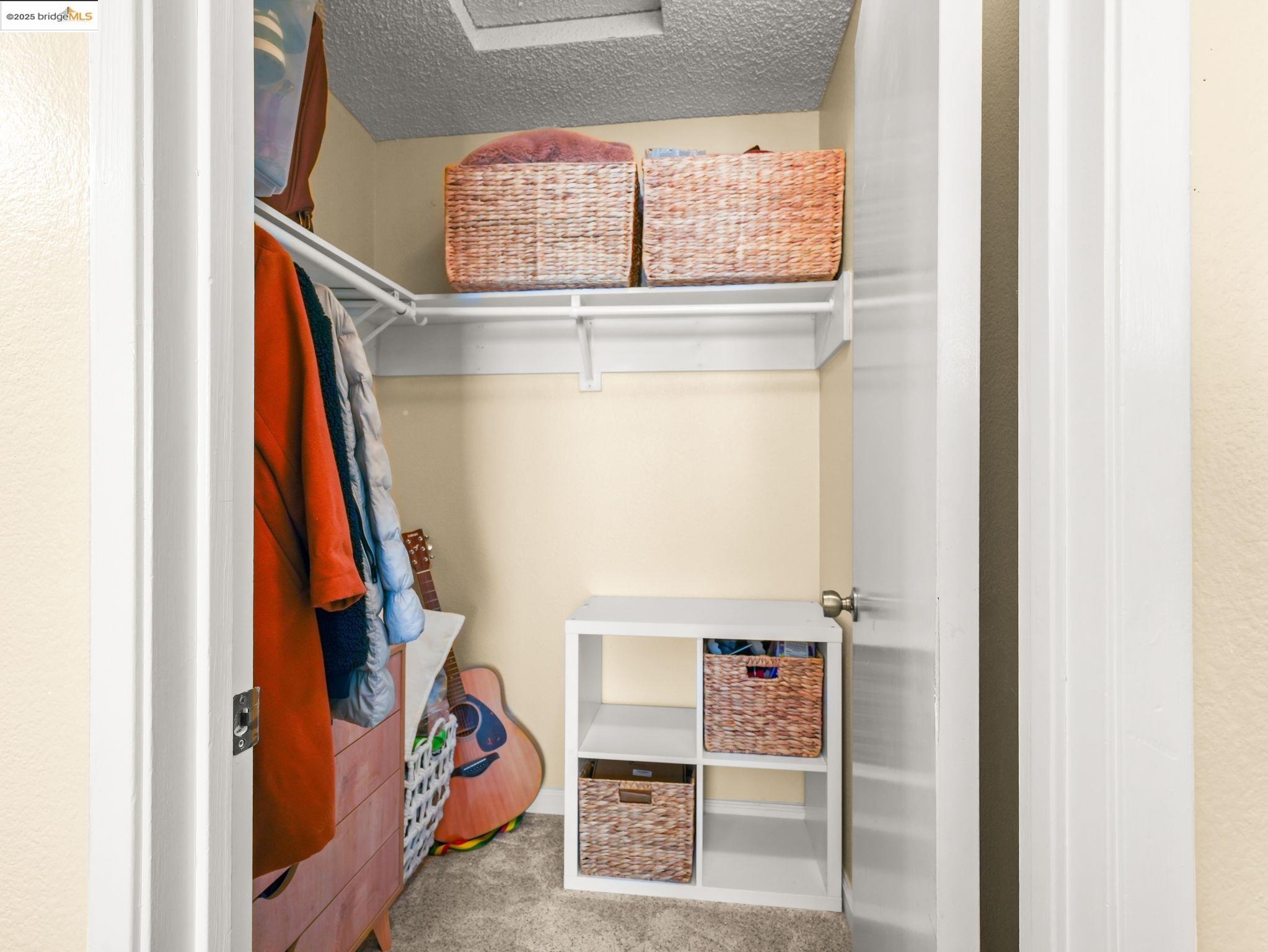 806 Devonwood Hercules, CA 94547 - Photo 19 of 24 a view of walk in closet with clothes