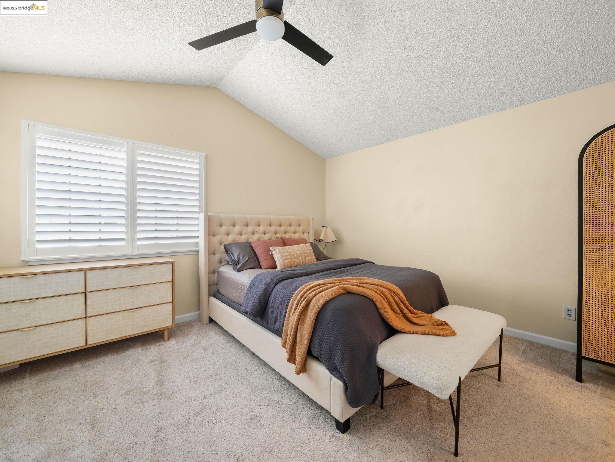 806 Devonwood Hercules, CA 94547 - Photo 23 of 24 a bedroom with a bed and a window