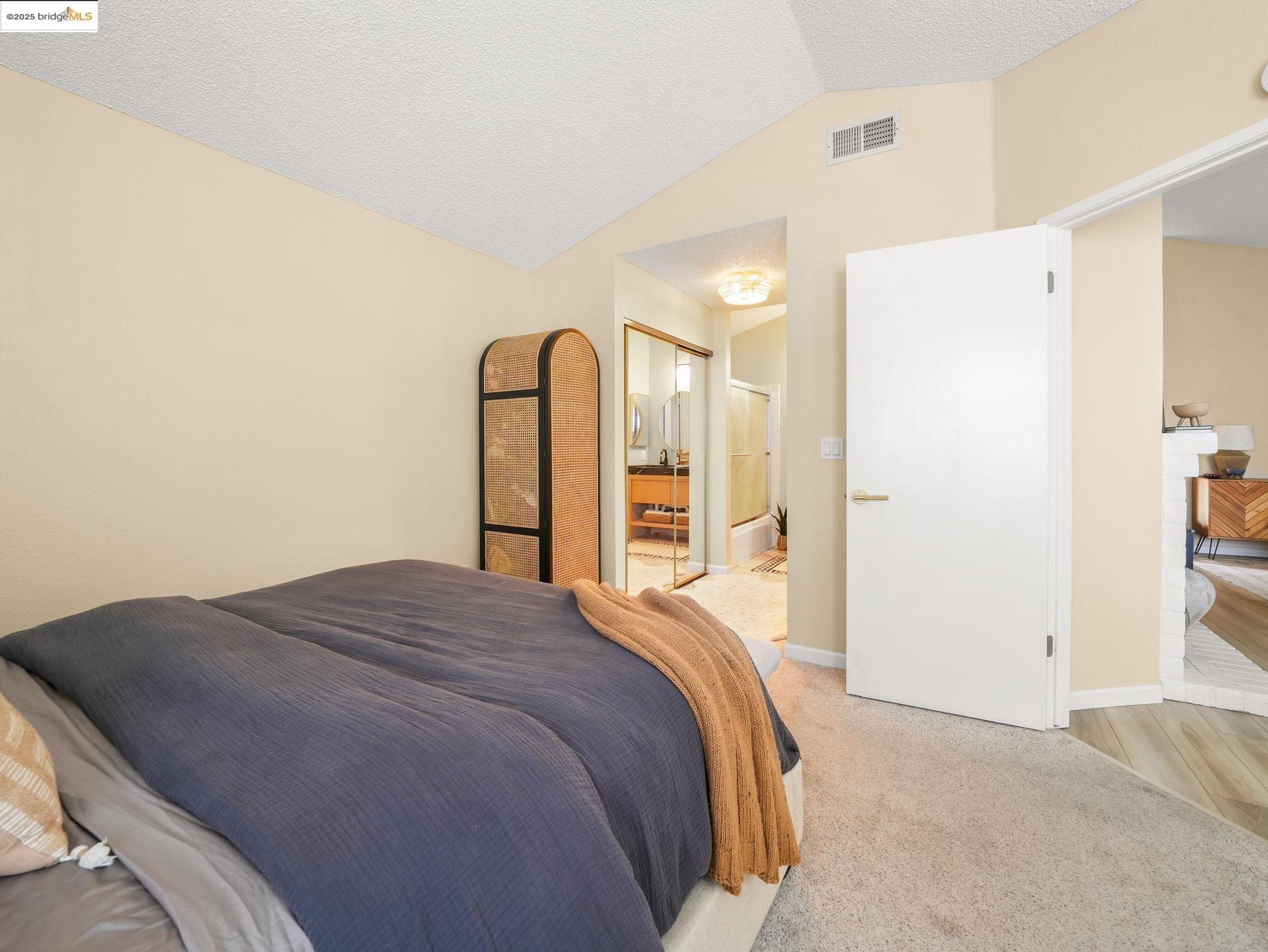 806 Devonwood Hercules, CA 94547 - Photo 24 of 24 a bedroom with a large bed and a closet
