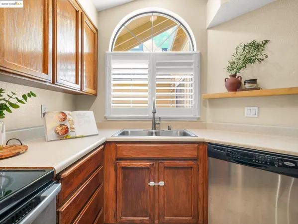 a white refrigerator freezer sitting in a kitchen