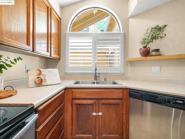 a white refrigerator freezer sitting in a kitchen
