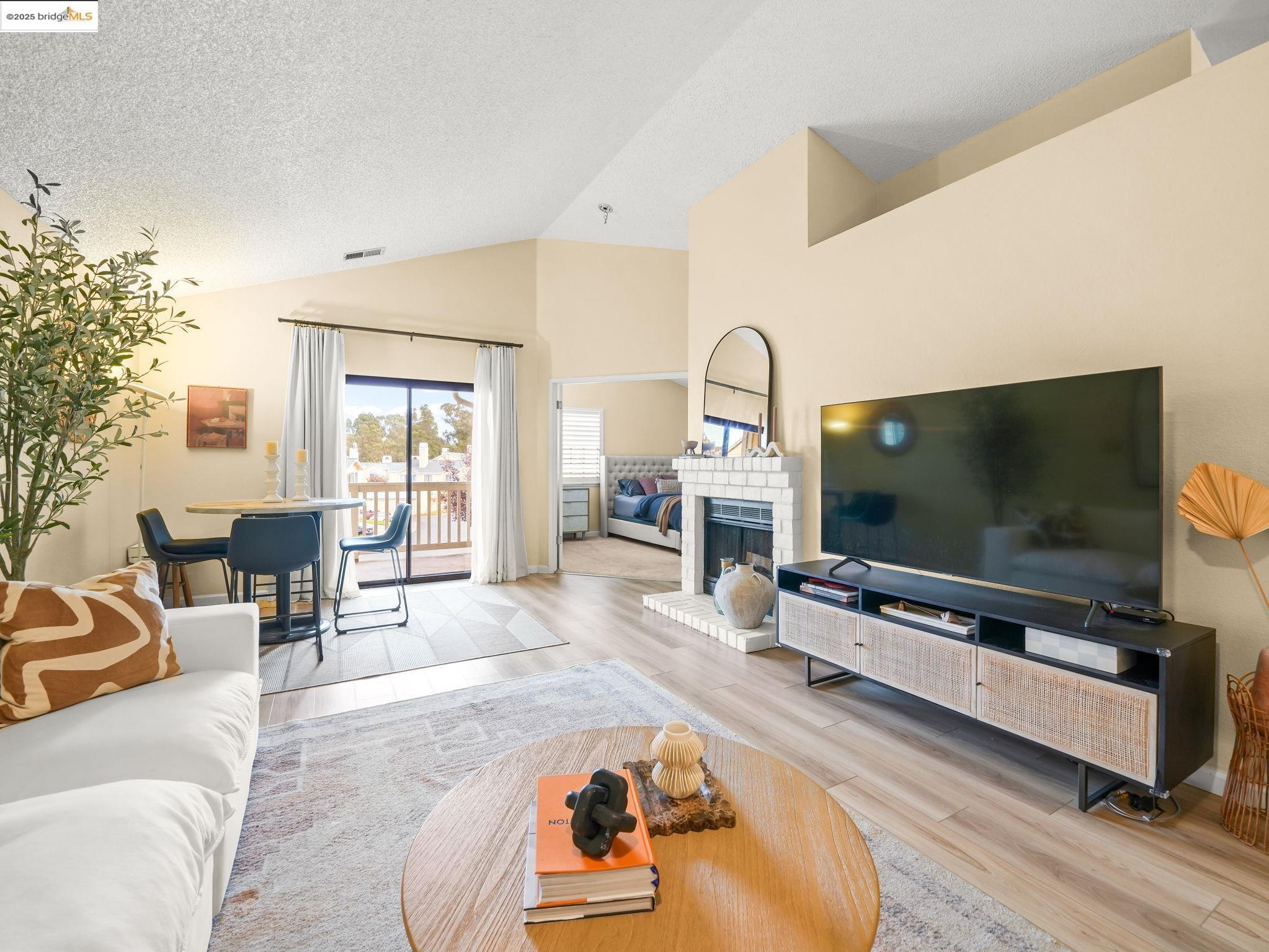 806 Devonwood Hercules, CA 94547 - Photo 10 of 24 a living room with furniture and a flat screen tv