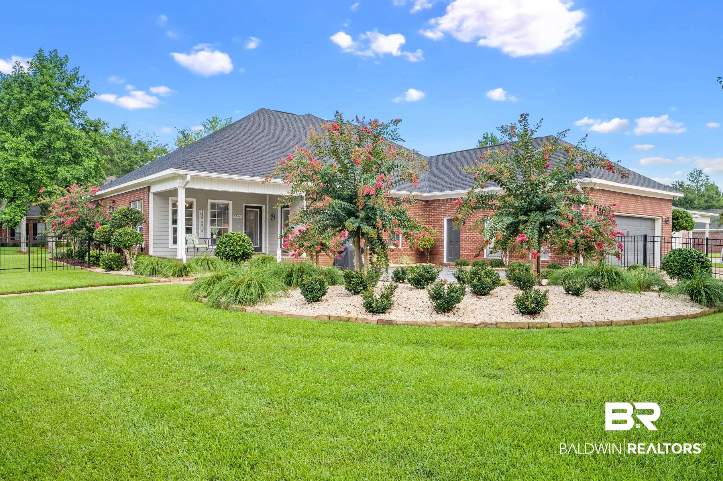 29614 St George Street Daphne, AL 36526 - Photo 38 of 42 View of front facade featuring a garage and a front yard
