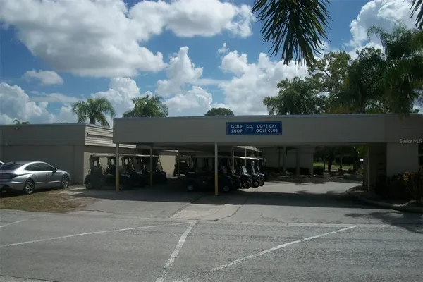 a couple of cars parked in parking area