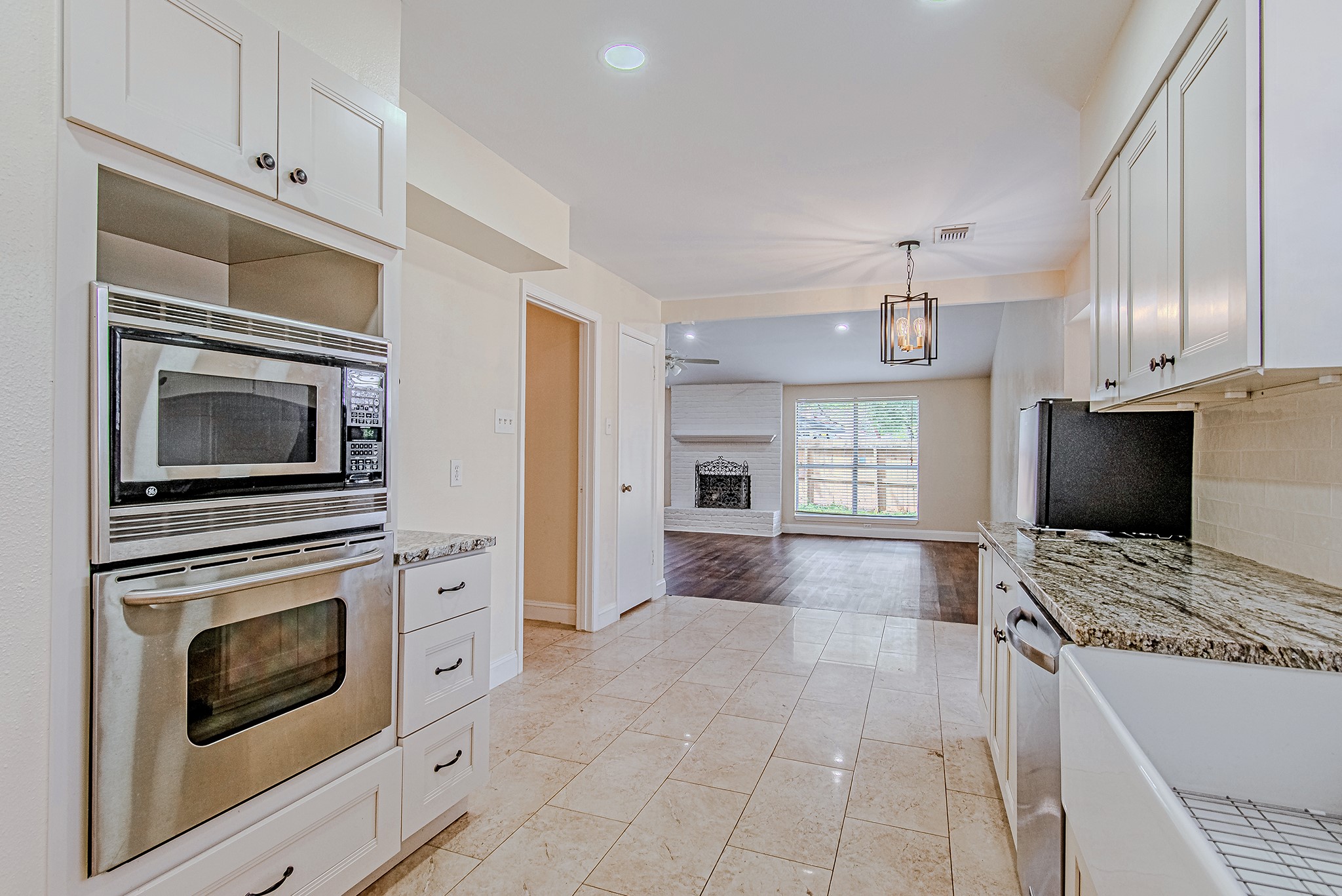 17811 Hawk Haven Lane Spring, TX 77379 - Photo 10 of 22 Kitchen featuring built-in appliances and generous prep space for everyday cooking.