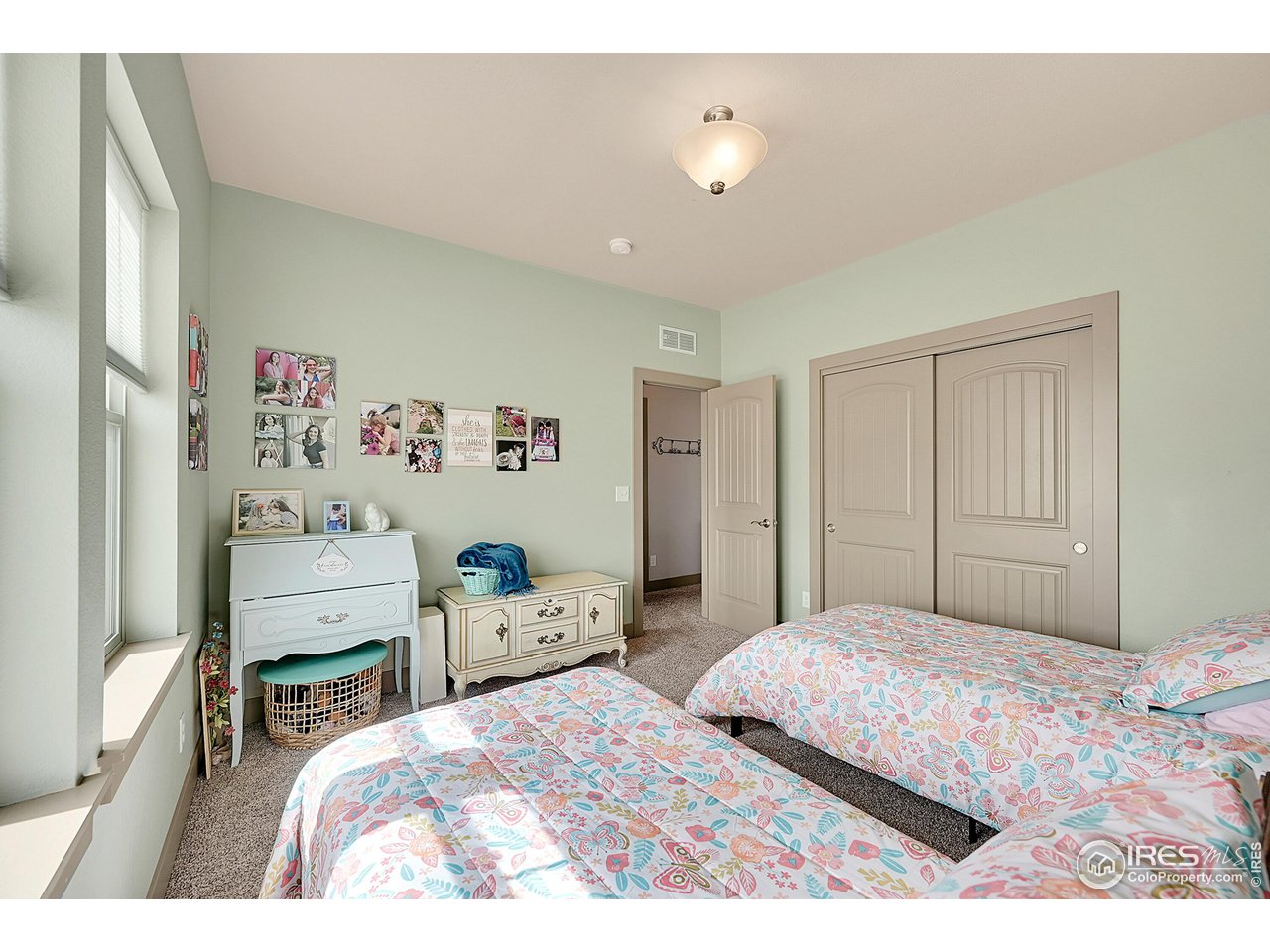 40775 Jade Drive Ault, CO 80610 - Photo 13 of 40 a bedroom with a bed and a view of bedroom