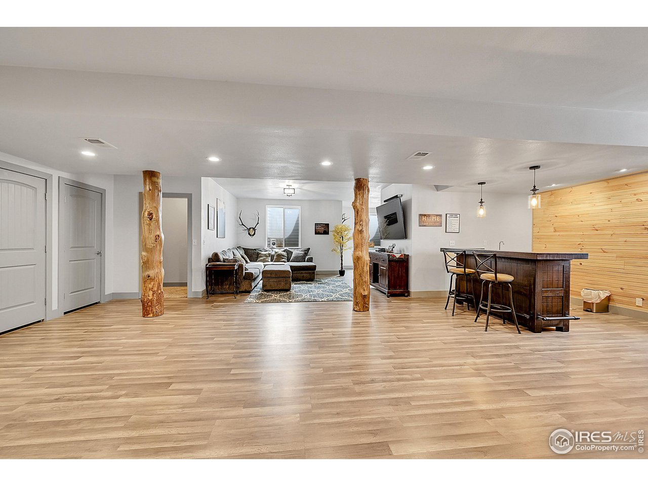 40775 Jade Drive Ault, CO 80610 - Photo 24 of 40 a living room with furniture and kitchen view