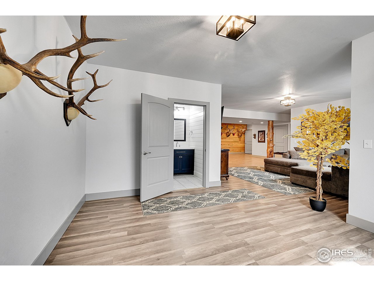40775 Jade Drive Ault, CO 80610 - Photo 28 of 40 a view of a livingroom with furniture and window