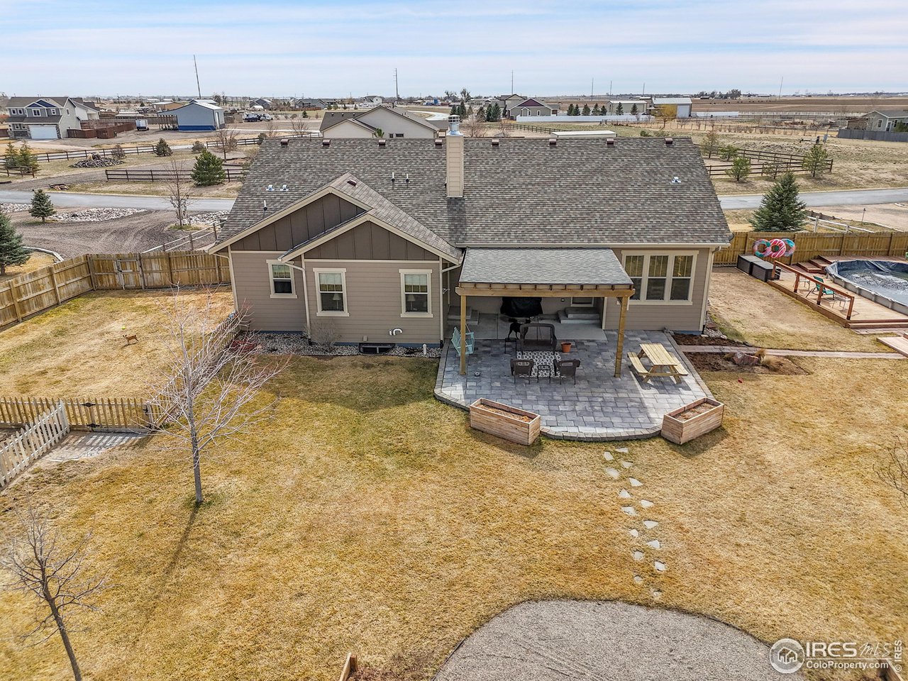 40775 Jade Drive Ault, CO 80610 - Photo 32 of 40 a view of a house with a yard