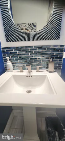 a bathroom with a toilet and a sink