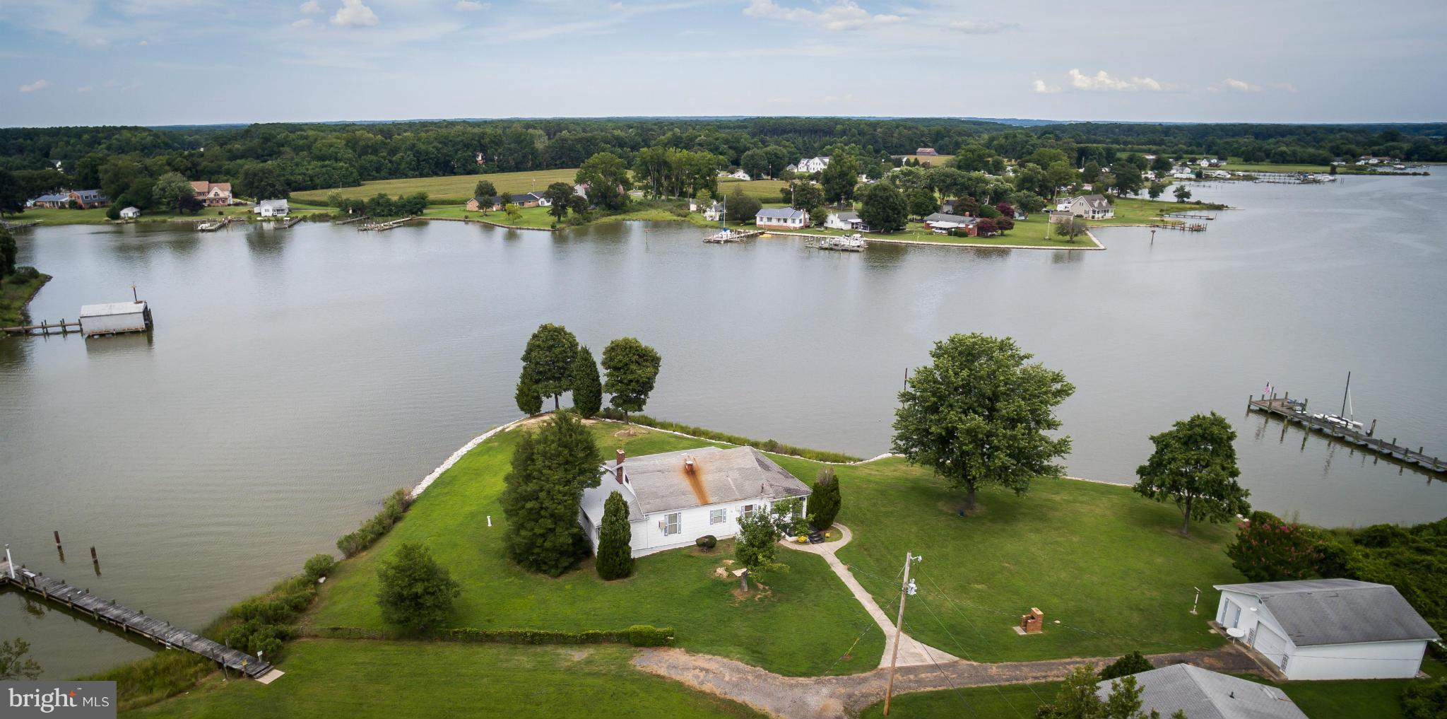 38130 Graves Road Coltons Point, MD 20626 - Photo 1 of 30 an aerial view of a houses with ocean view
