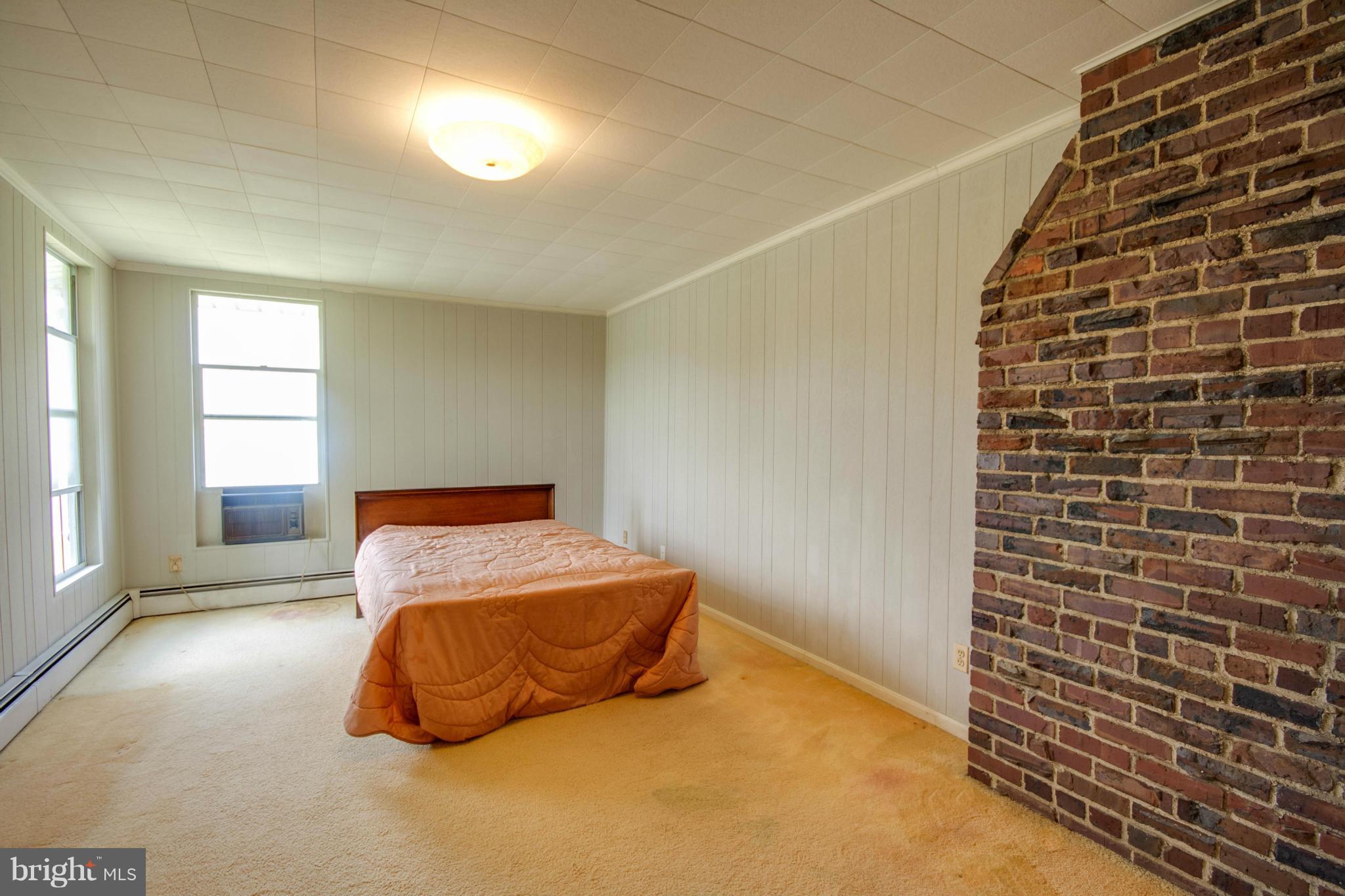 38130 Graves Road Coltons Point, MD 20626 - Photo 18 of 30 a bedroom with a bed and a window