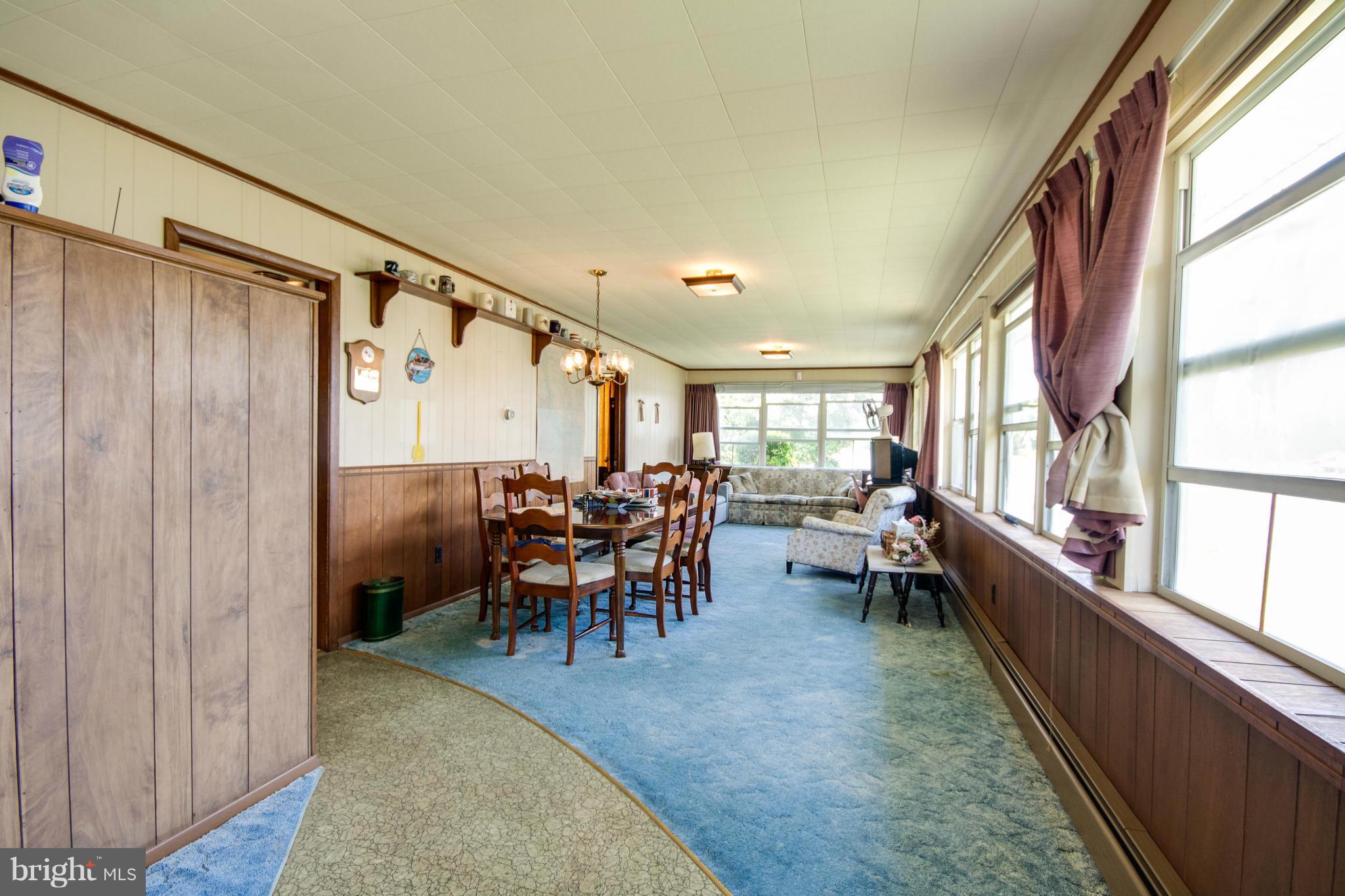 38130 Graves Road Coltons Point, MD 20626 - Photo 20 of 30 a dining room with furniture and a window
