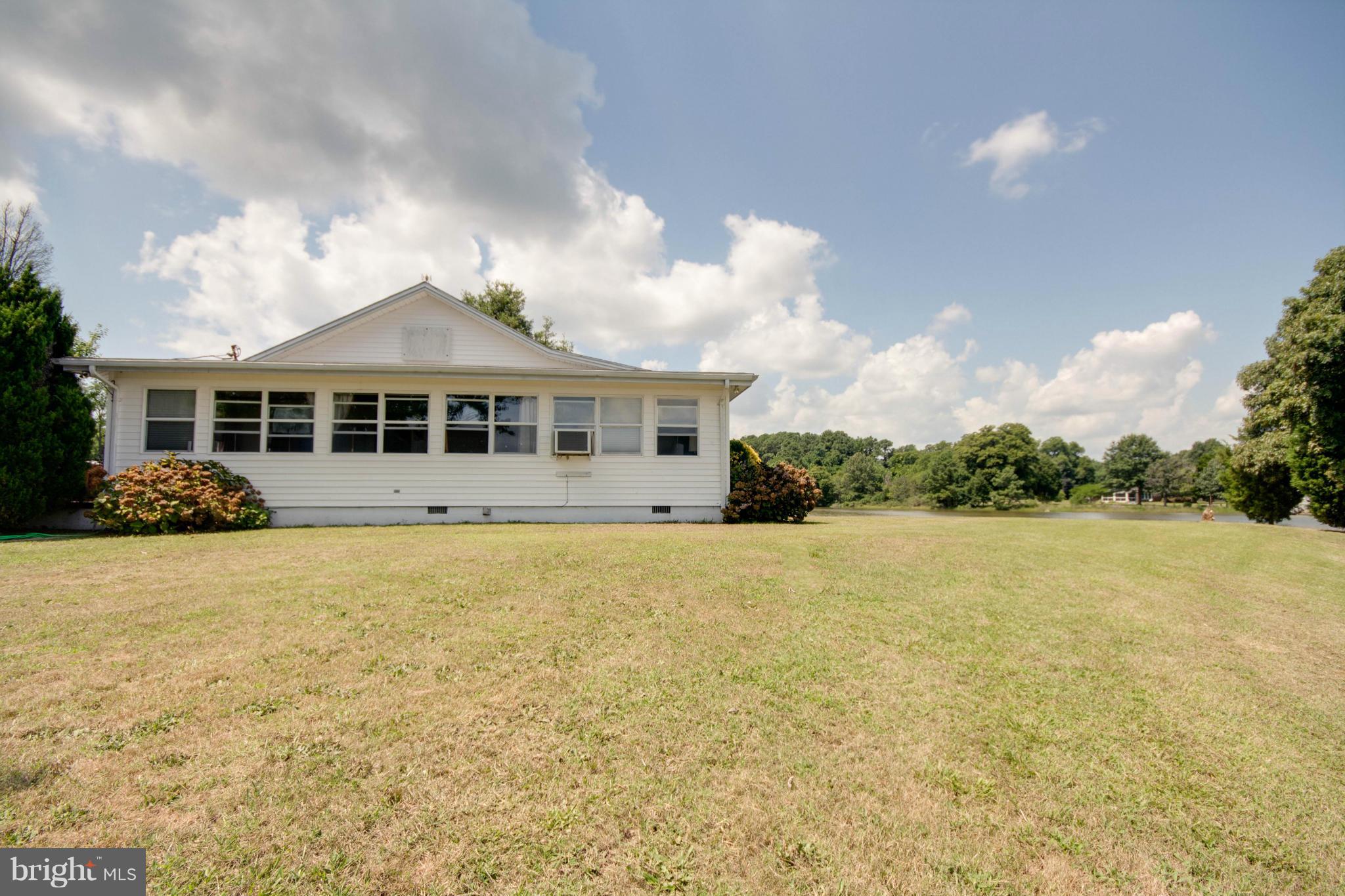 38130 Graves Road Coltons Point, MD 20626 - Photo 22 of 30 a view of a house with a swimming pool