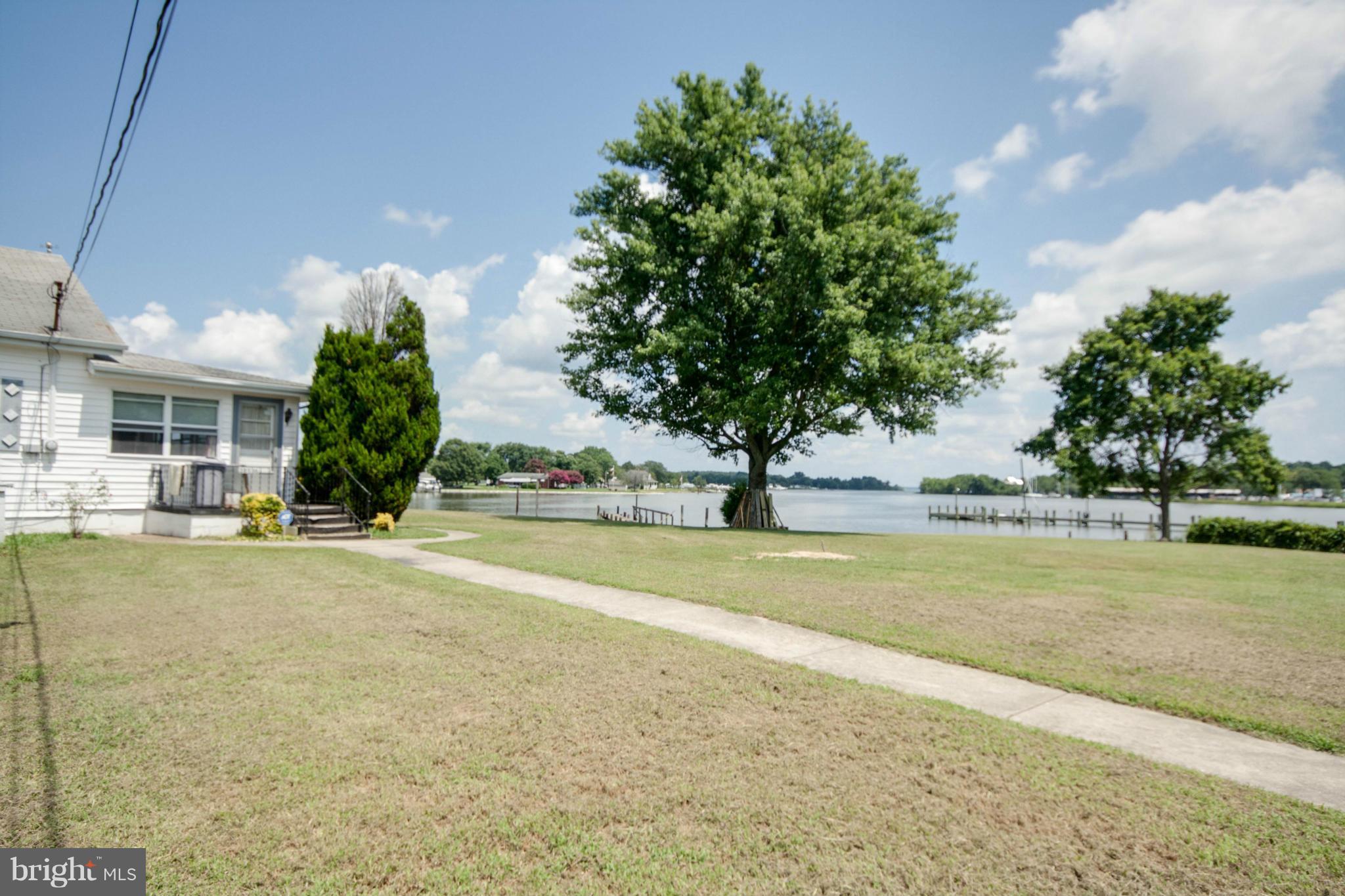 38130 Graves Road Coltons Point, MD 20626 - Photo 24 of 30 a view of a house with a yard and tree s