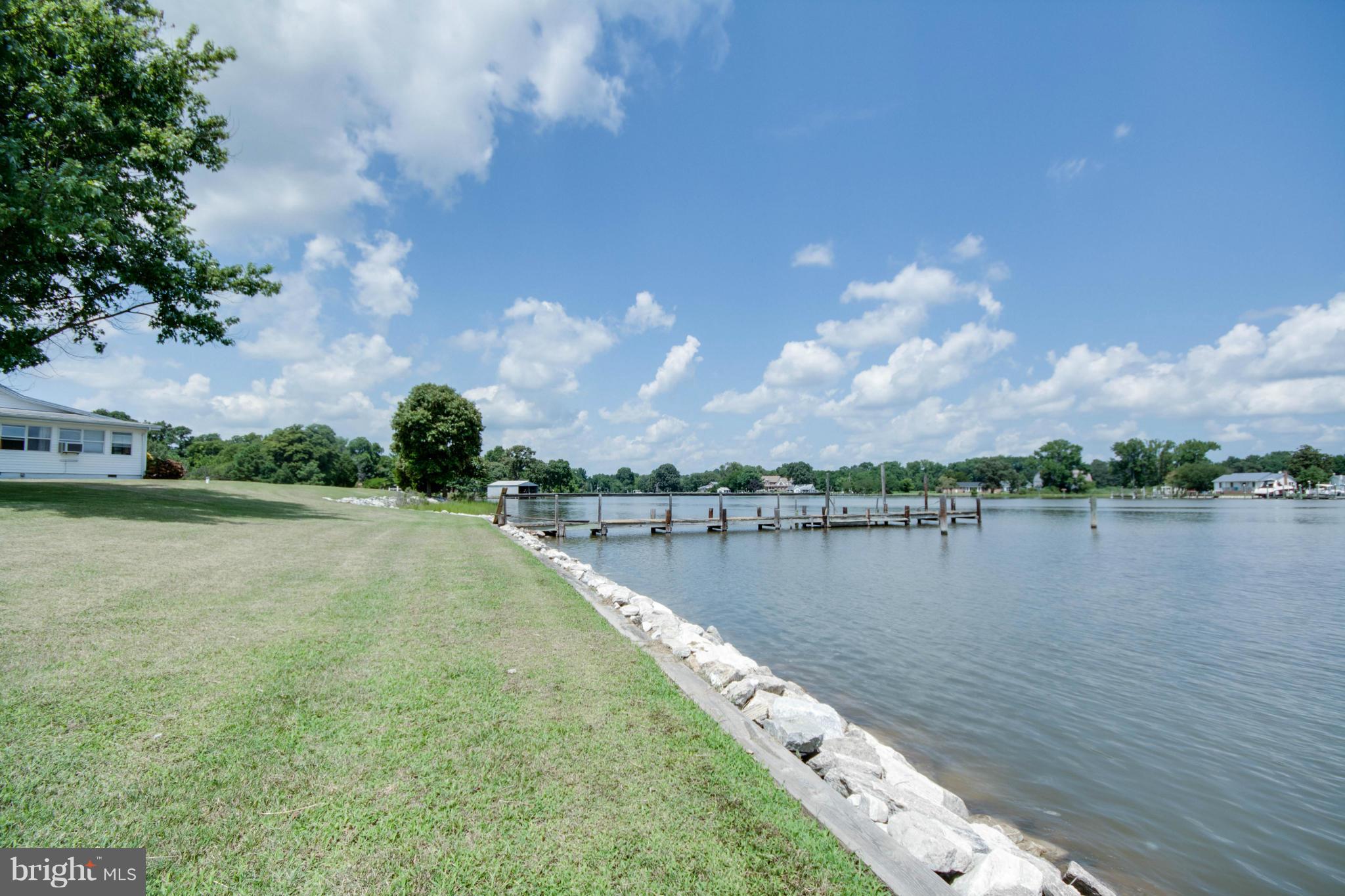 38130 Graves Road Coltons Point, MD 20626 - Photo 26 of 30 a view of a lake with a yard
