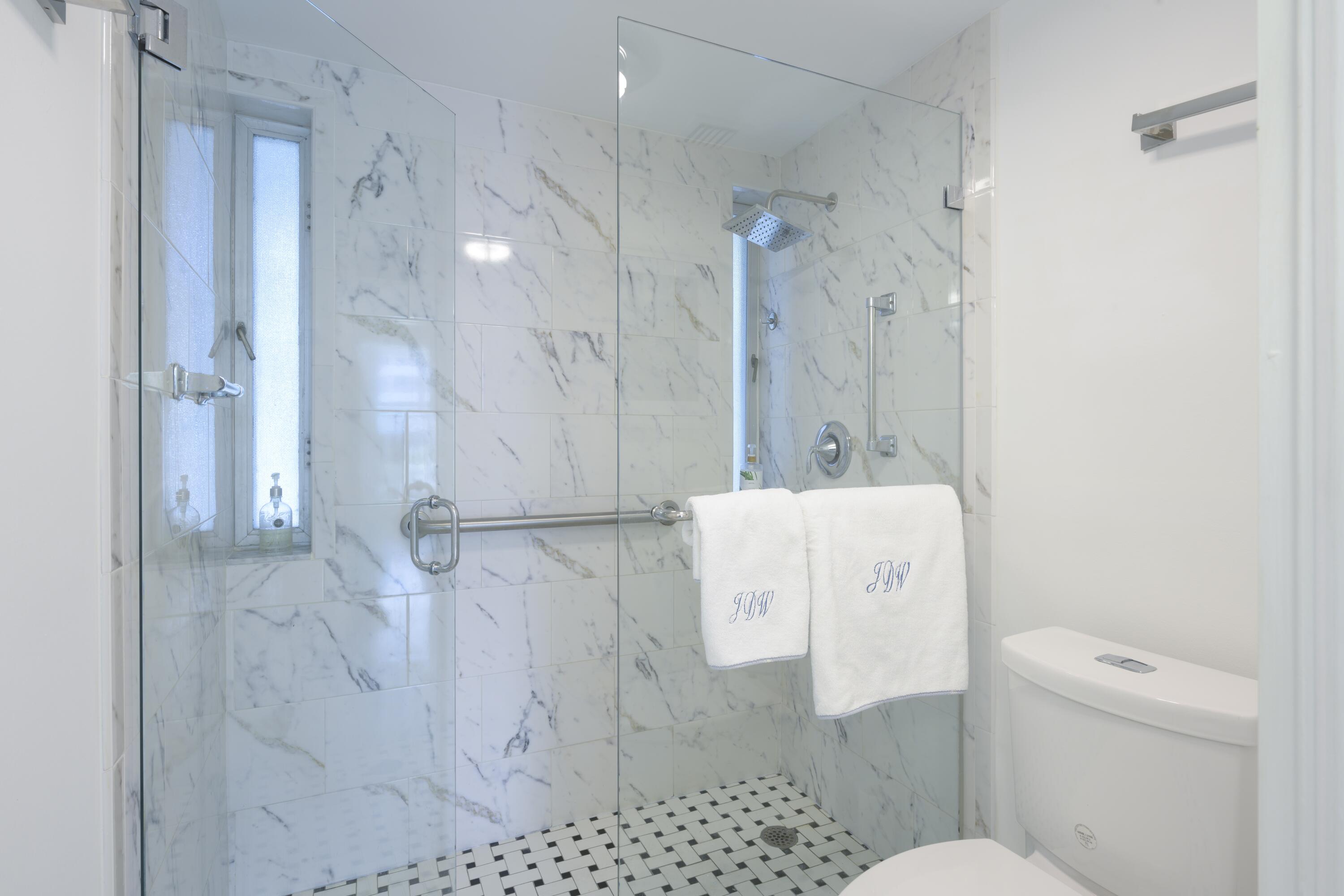 2760 South Ocean Boulevard, Unit 213 Palm Beach, FL 33480 - Photo 12 of 24 a bathroom with a shower toilet and sink