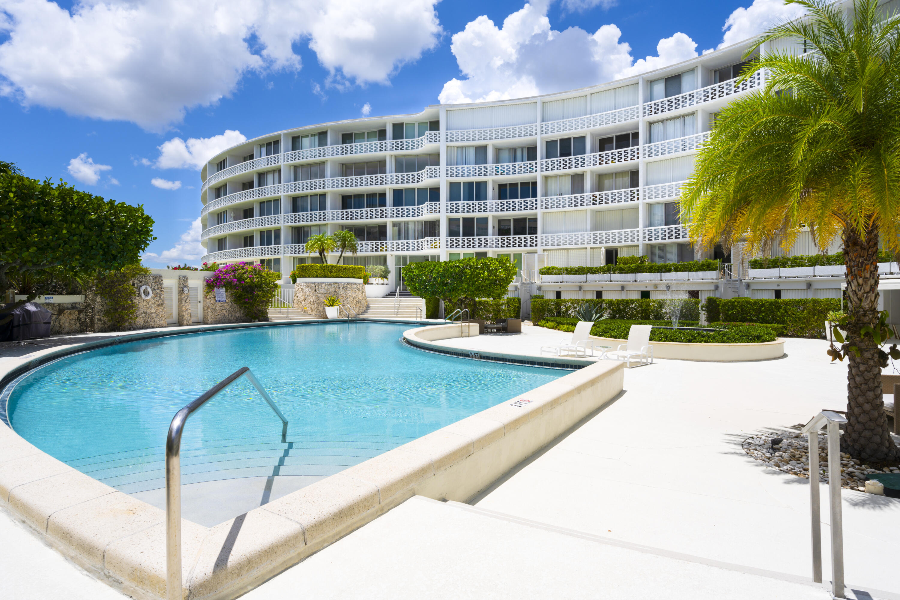 2760 South Ocean Boulevard, Unit 213 Palm Beach, FL 33480 - Photo 14 of 24 a view of building with outdoor space and seating area