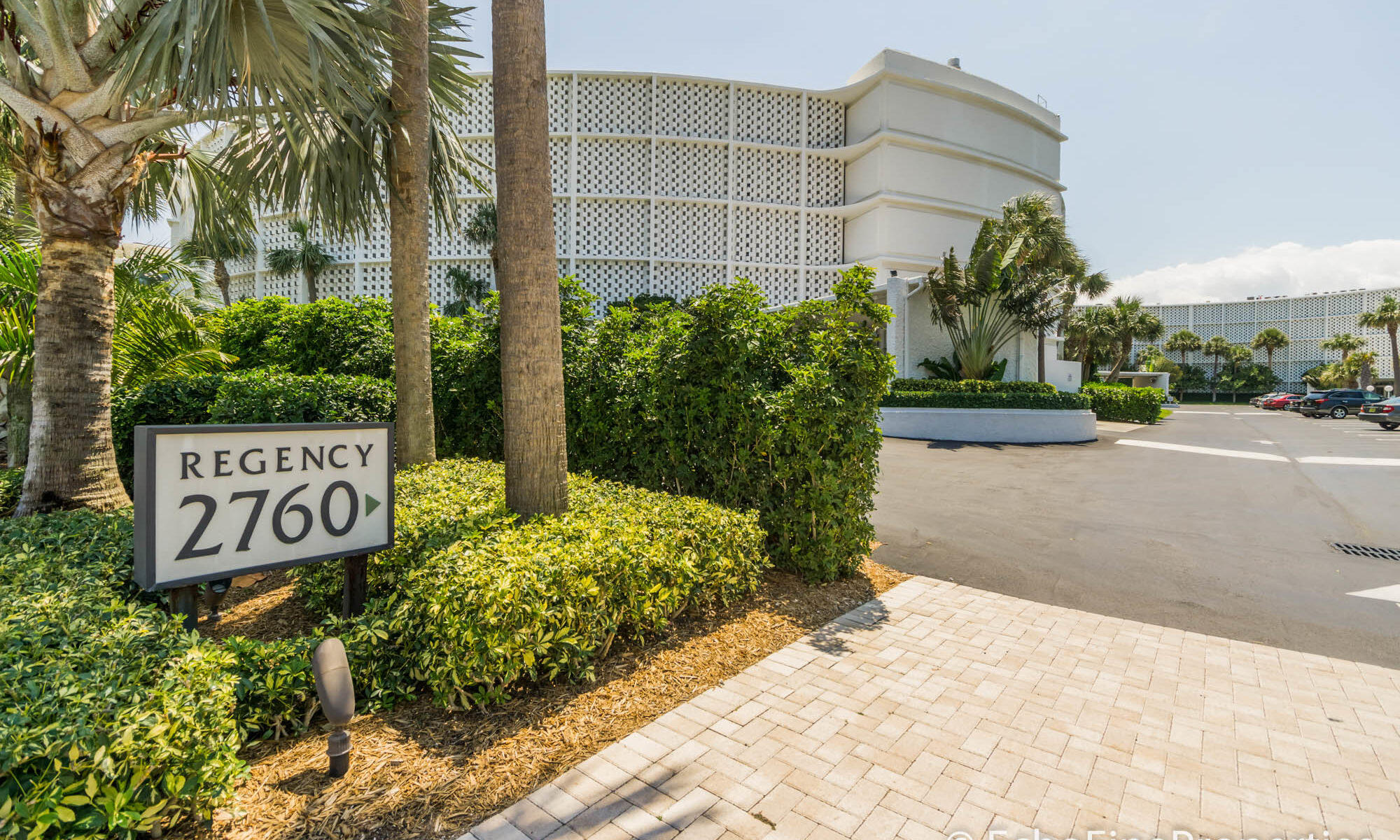 2760 South Ocean Boulevard, Unit 213 Palm Beach, FL 33480 - Photo 19 of 24 a sign board with buildings in front of it