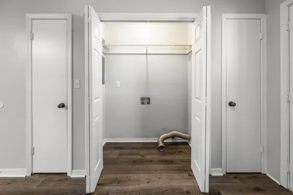 a bathroom with a tub and shower curtain