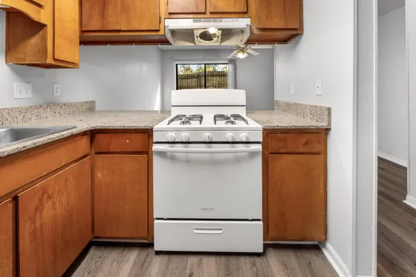 a view of a storage and utility room with washer and dryer