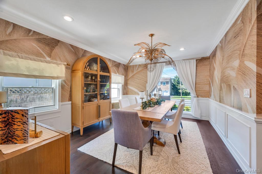 357 Wynsum Avenue Merrick, NY 11566 - Photo 8 of 40 a view of a dining room with furniture window and outside view