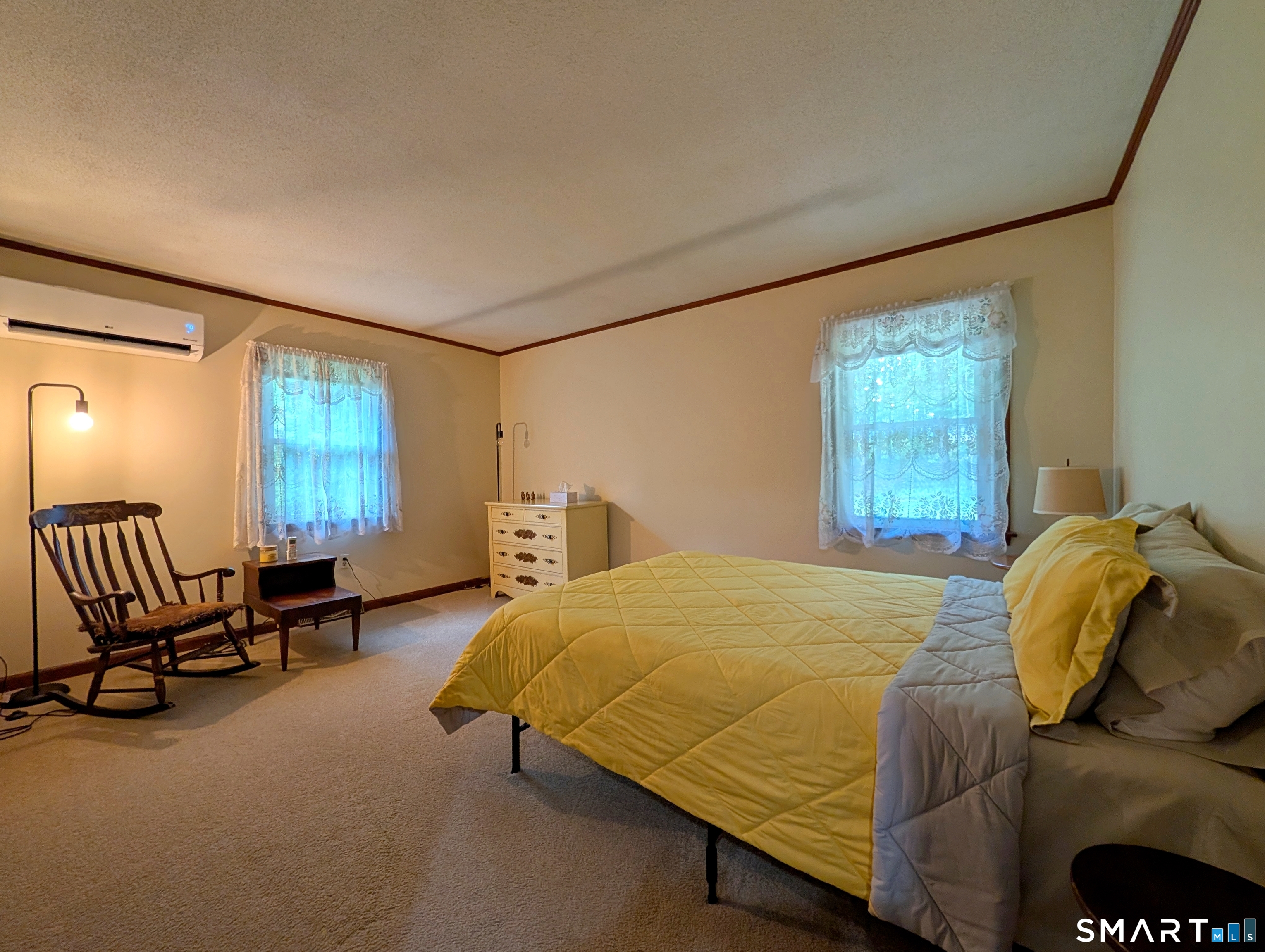 17 Colebrook Road Norfolk, CT 06058 - Photo 21 of 21 a bedroom with a bed chair and window