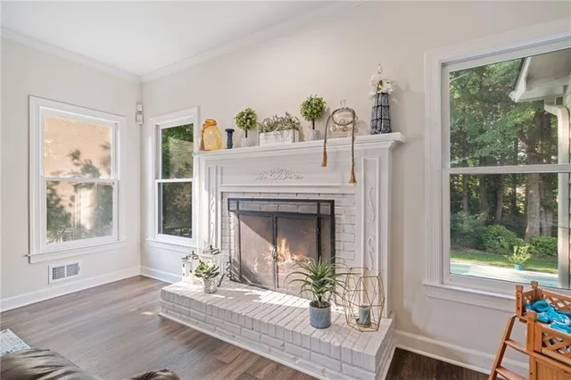 a kitchen with stainless steel appliances granite countertop a refrigerator and a stove