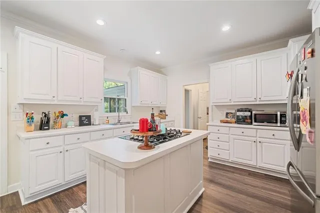 a bathroom with a sink a vanity and a mirror