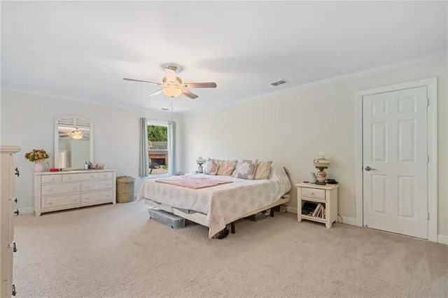 an aerial view of a houses with a yard