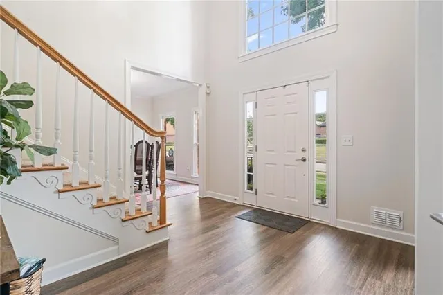 a view of entryway with wooden floor