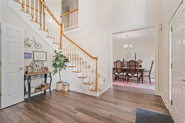 a view of dining room with furniture and wooden floor