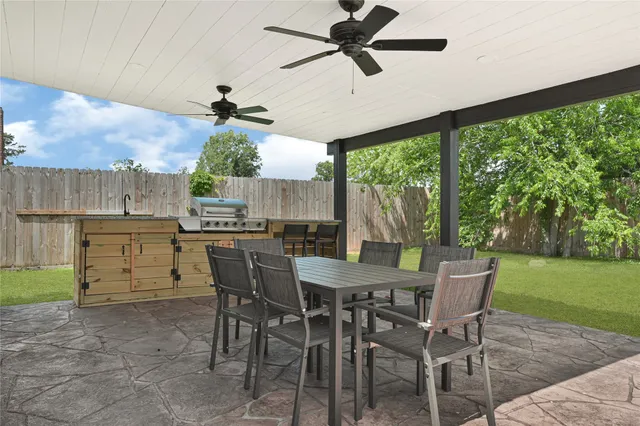 a swimming pool with wooden fence