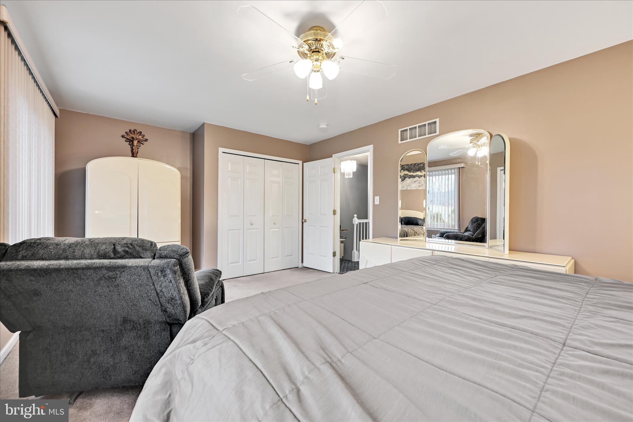 160 Riders Way Lebanon, PA 17042 - Photo 17 of 29 a bedroom with a bed and a chandelier