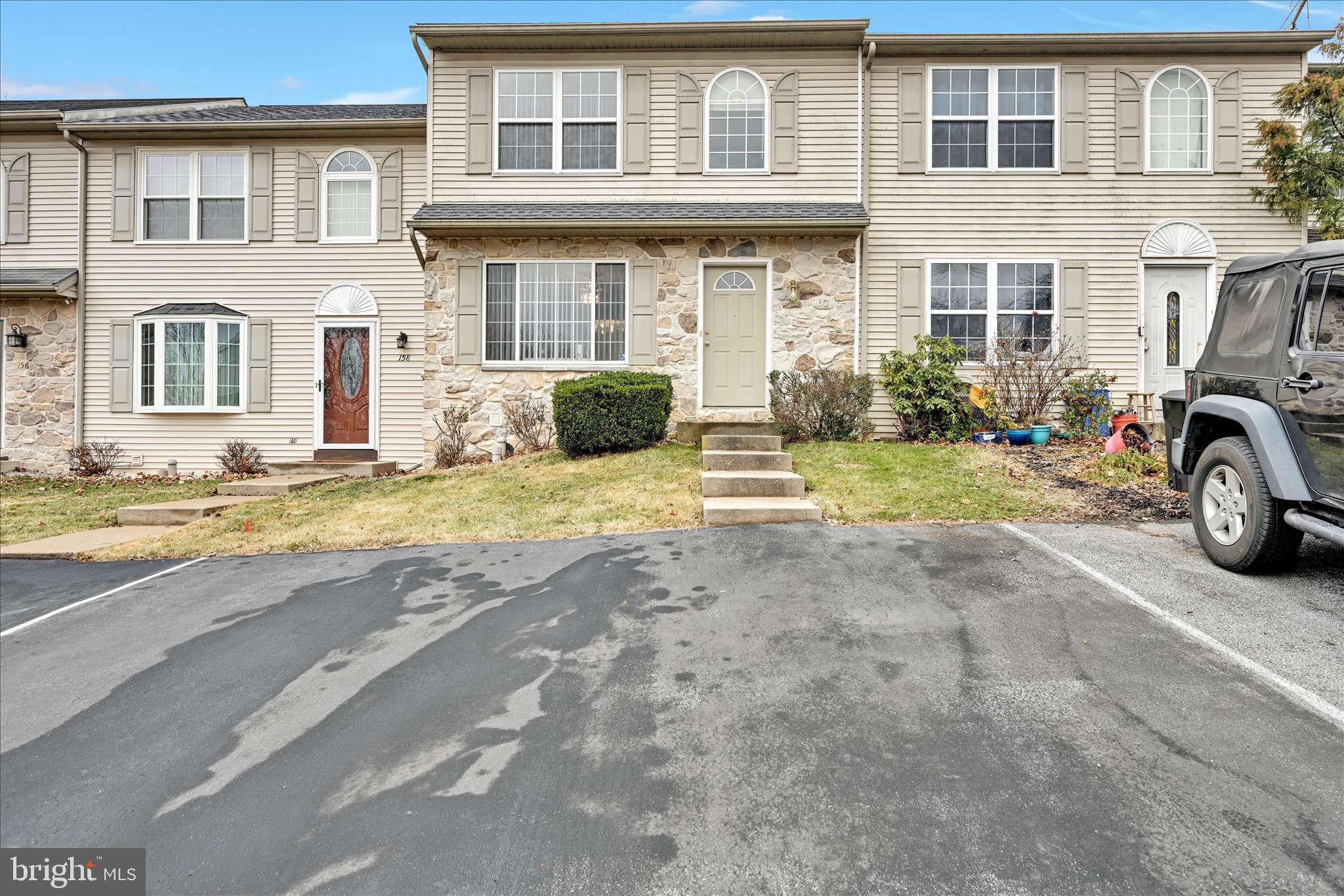 160 Riders Way Lebanon, PA 17042 - Photo 4 of 29 a view of a house with a big yard and large trees