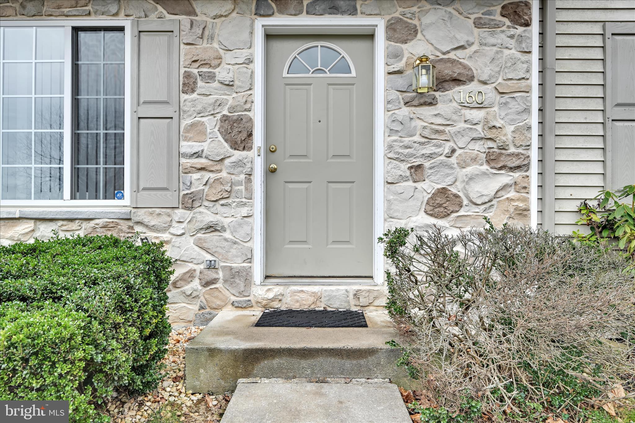 160 Riders Way Lebanon, PA 17042 - Photo 5 of 29 a front view of a house with a garden
