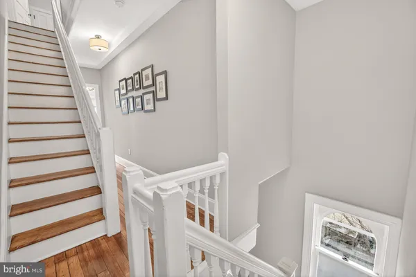 a spacious bedroom with a large bed and a window