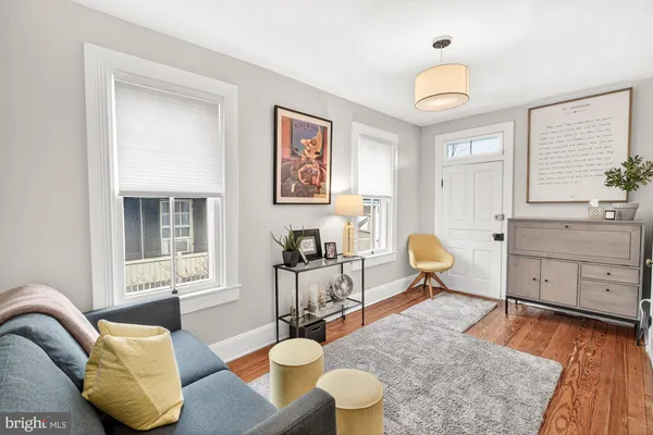 a bedroom with a bed and a chair