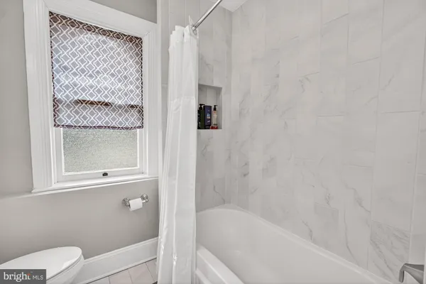 a view of a storage room with shelves