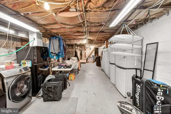 a view of a car is parked in front of a building