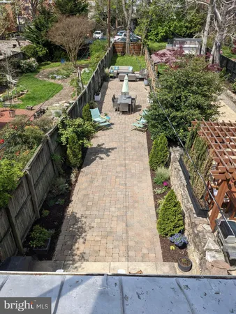 a view of a brick building with many windows
