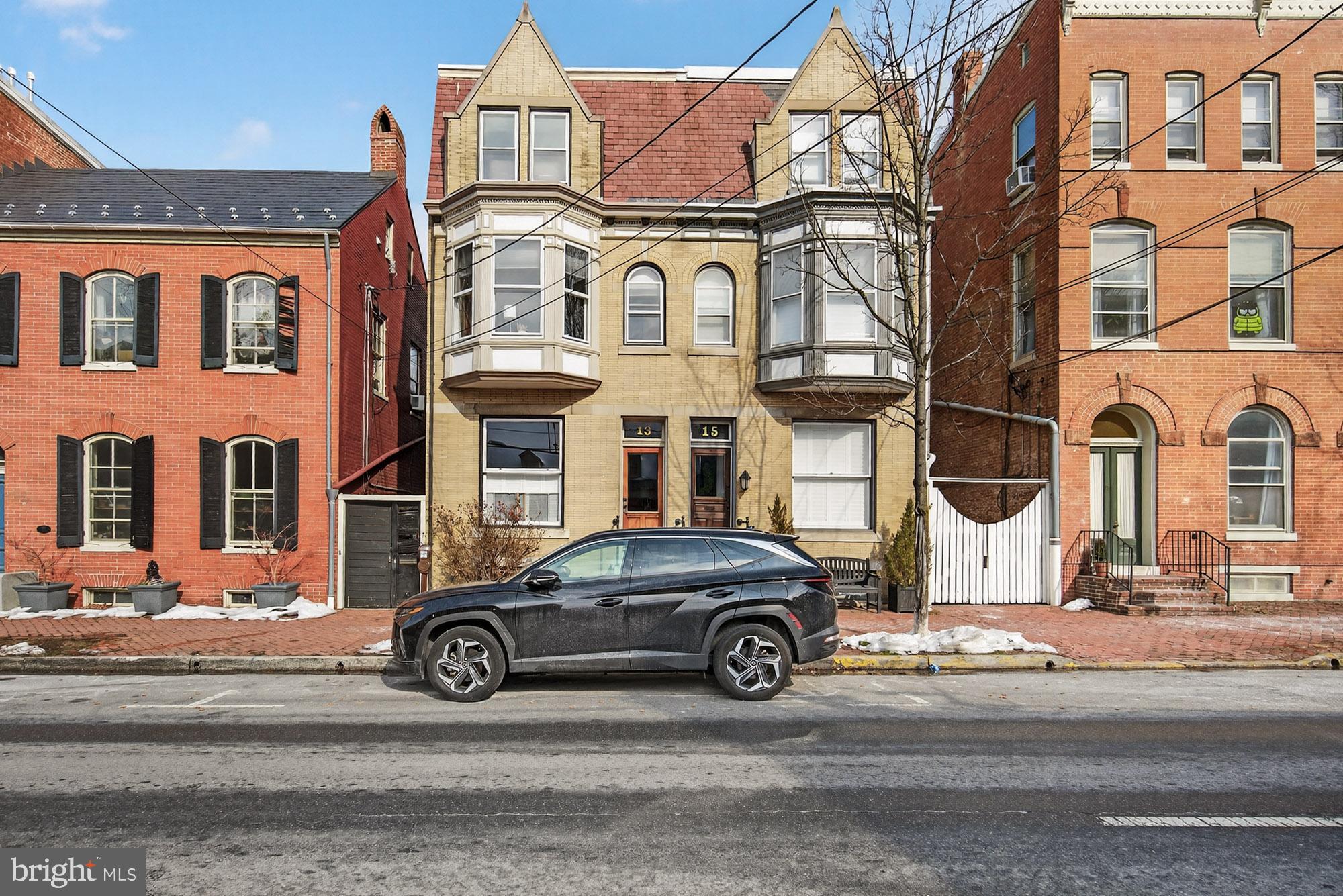 13 East 2nd Street Frederick, MD 21701 - Photo 58 of 65 a car parked in front of a white building